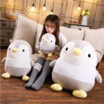 A set of plush chubby penguin plushies, soft and cuddly.