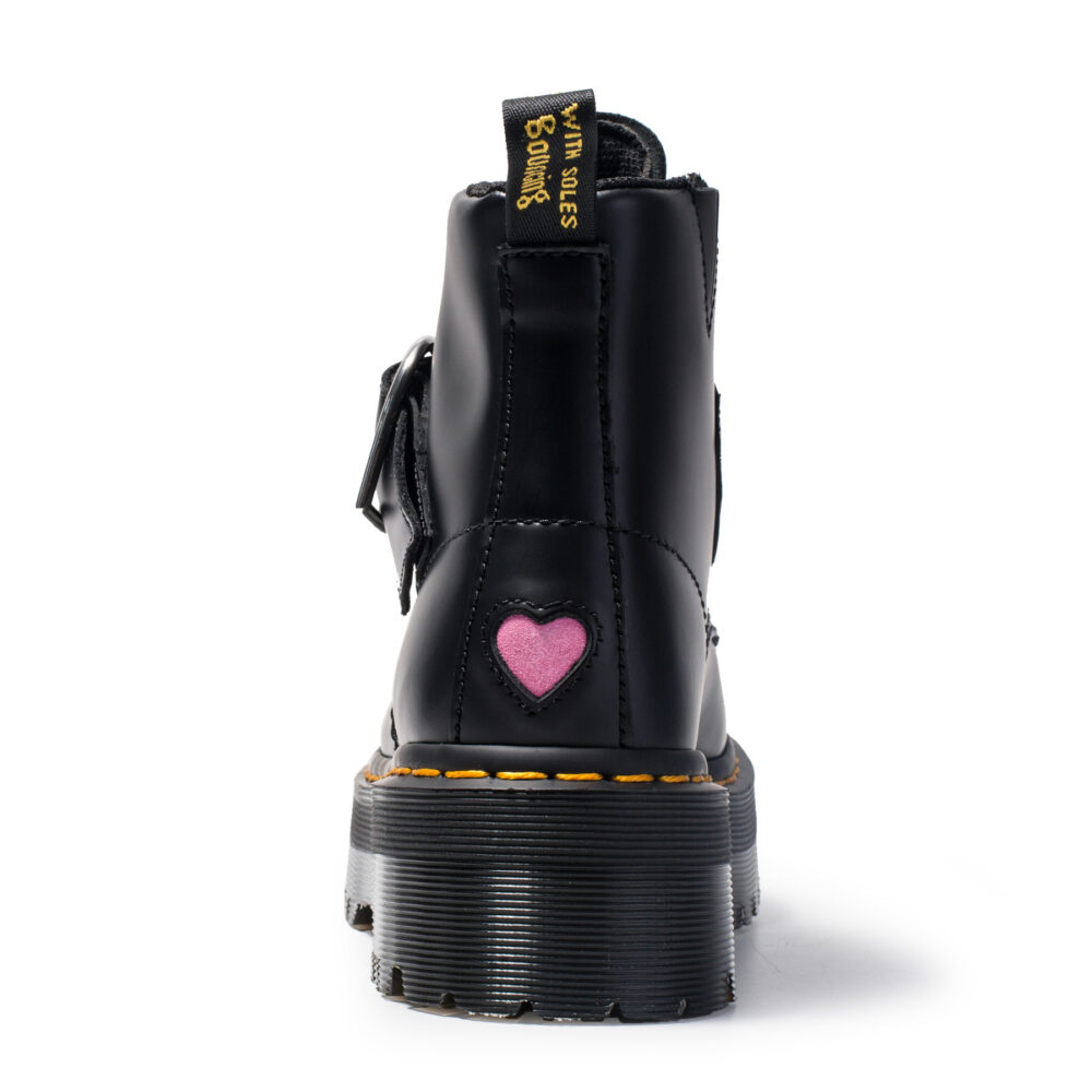 Black kawaii platform heart boots with a pink heart detail and chunky sole.