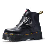 Black kawaii platform heart boots with a yellow sole and buckle detail. Part of the Kawaii Gothic Collection.