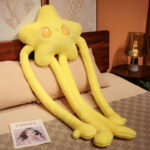 Yellow long limb plushie with star eyes and flowing limbs, soft plush material.