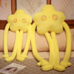 Two yellow long limb plushies with star eyes and long limbs, cute and soft.