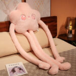 Pink long limb plushie with flowery star details and large, expressive eyes.