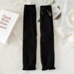 Black ribbed Cute Bow Gyaru Socks with a satin bow detail. Kawaii aesthetic.