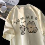 Cream colored kawaii cat shirt with "Summer fun" graphic.