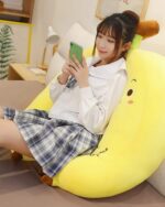 Cute yellow banana plushies in a three-pack edition, showcasing a plush toy with a smiling face.