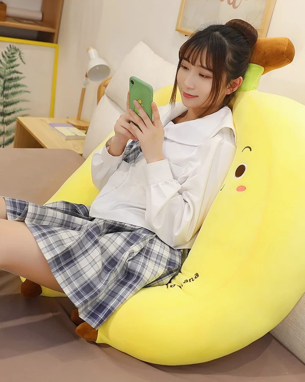 Cute yellow banana plushies in a three-pack edition, showcasing a plush toy with a smiling face.