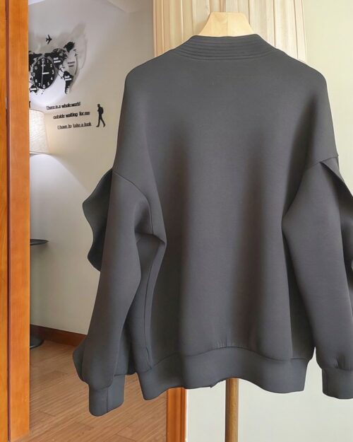 Gray long sleeve lace cardigan kawaii aesthetic, hanging on a hanger.