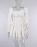 White French aesthetic dress with lace details, puff sleeves, and a tie closure.