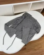 Gray ribbed dark gyaru set with tie closure and ruffles.