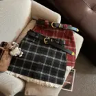 Black and red plaid mini skirt, preppy aesthetic skirt with belt and accessories.