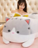 Large grey molang bunny plushie, kawaii stuffed animal with big ears.