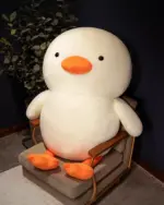 Kawaii duck plushie, Winston the Duck, a large, plush white duck with orange feet and beak.