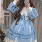 Plus size hime lolita dress featuring a light blue ruffled design with lace details and a teddy bear accent.