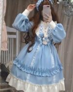 Plus size hime lolita dress featuring a light blue ruffled design with lace details and a teddy bear accent.