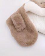 Close-up of a brown reindeer winter hat, plush and fluffy.