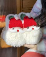 Pair of kawaii santa claus home slippers with pom-poms and plush details.