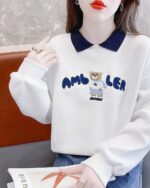 White korean aesthetic sweatshirt featuring a cute bear embroidery and text.