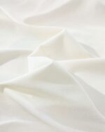 Close-up of a cream-colored Short-sleeved Cat T-shirt - Kawaii Clothes fabric.