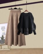 Brown knit skirt and black sweater, a Korean aesthetic set showcasing a relaxed style.