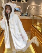 White kawaii cat hoodie with ear accents and padded coat design.