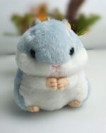 Cute kawaii chibi hamster plushie, soft and cuddly keychain. Small, blue and white rodent plush.