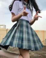 JK plaid skirt in teal and green, pleated style, kawaii clothing outfit.