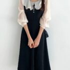 Black puff sleeve dress featuring a french aesthetic dress ruffle collar and sleeves.