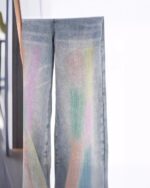 Colorful y2k aesthetic jeans featuring a vibrant watercolor design and loose fit.