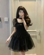 High Waist Black Dress - Aesthetic Vintage, black dress with puff sleeves and ruffles.