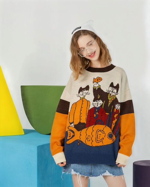 Retro cat reunion sweater featuring cartoon cats and a fish design on a knit sweater.
