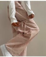 Close-up of korean aesthetic pants with a drawstring tie at the waist.