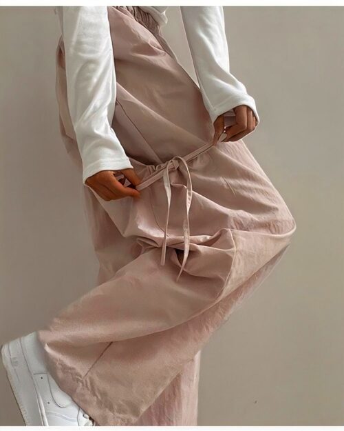 Close-up of korean aesthetic pants with a drawstring tie at the waist.