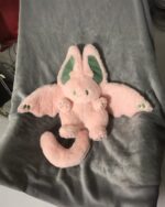 Kawaii bat rabbit plushie, soft pink and green aesthetic plushie.