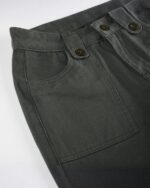 Olive green y2k aesthetic pants featuring a high waist and pocket detail.