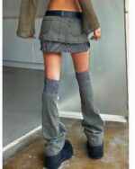 American-style y2k aesthetic skirt featuring layered denim and a striped lining.