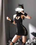 Black kawaii cat girl dress with lace-up details and thigh-high stockings.