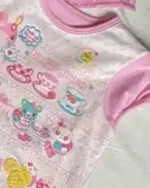 Kawaii pink princess t-shirt featuring pastel characters and tea party motifs.