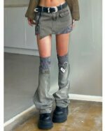 American-style denim skirt with y2k aesthetic details, featuring patchwork and multiple pockets.