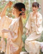 Two women wearing a Hanabi Pattern summer yukata dressing, featuring a floral design.