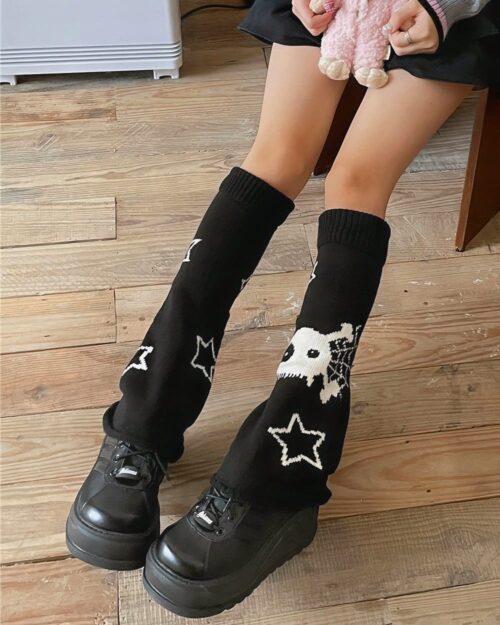 Black gyaru leg warmers with skull and star patterns, gothic aesthetic.