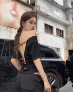 Black korean off-shoulder top with open back detail.
