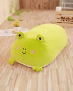 Green animal mochi plushie featuring a cute frog face and smiling expression.