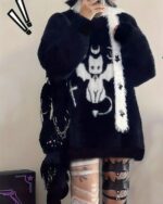 Black kawaii neko sweater with goth punk aesthetic details.