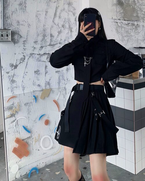 Black gothic aesthetic set featuring a cropped shirt and pleated skirt, styled with accessories.