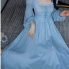 Light blue Long Sleeve Fairy Dress with lace detailing and puff sleeves.