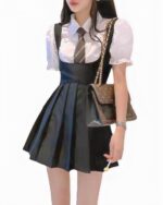 Black korean aesthetic dress with suspenders and ruffled skirt, featuring a white shirt.