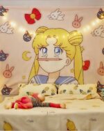 Anime wall tapestry featuring Sailor Moon character on a patterned wall. Decorative hanging cloth.