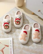 Pair of christmas plushy slippers featuring a reindeer and bear design.