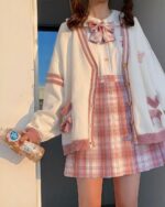 Japanese Style Bowed Cardigan Set - Soft girl cardigan set, featuring a cream cardigan and plaid skirt.