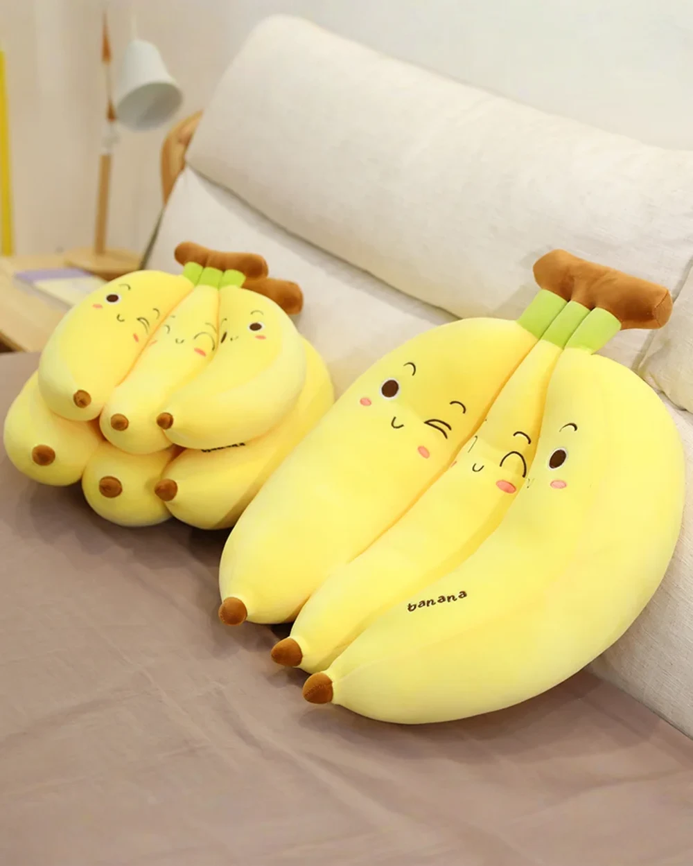 Cute yellow banana plushies in a three-pack edition. Soft, detailed plush toys.